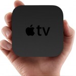 apple tv in hand